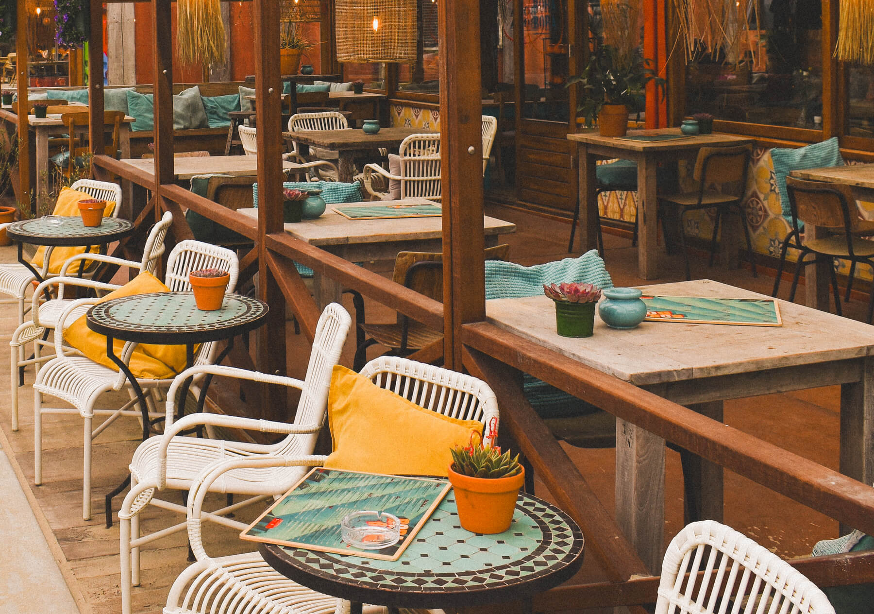 outdoor cafe with rustic wooden tables and benches 2024 02 12 16 09 43 utc.jpg